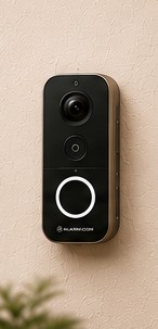 Video doorbell mounted beside a front door